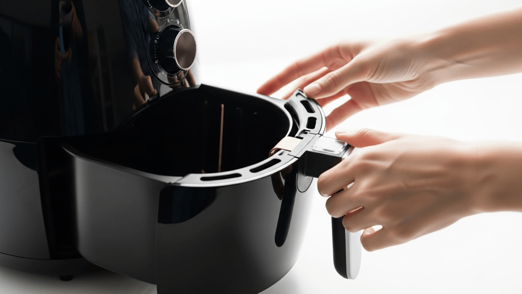 Air fryer basket handle use